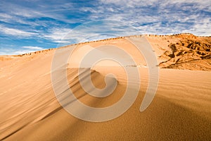 Sand dune at Valle de la Muerte in the Atacama Desert photo
