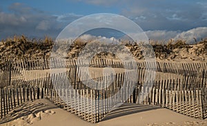 Sand dune windswept fences in East Hampton New York photo