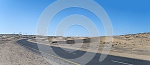 sand dunes and B4 tar road in Sperrgebiet desert, near Luderitz, Namibia