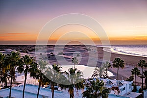 Sand dunes beach of Maspalomas Gran Canaria during sunrise