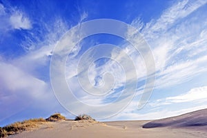 Sand dunes and beautiful cloud covered skies