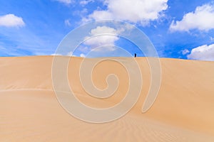 Sand dunes in Boavista desert with blue sky and clouds, Cape Verde - Cabo Verde