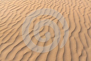 Sand dunes, desert patterns background