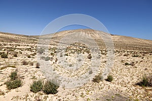 Sand dunes and mountains near Sotavento beach on Jandia peninsul