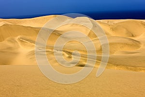 SAND DUNES NEAR WALVIS BAY IN NAMIBIA