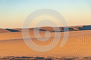 Sand dunes at sunset along the western coast of the Baja peninsula