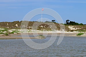 Sand dunes and tide pool at Fort Macon