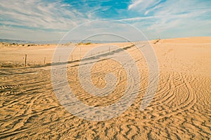 Sand dunes and Tire tracks on sand, Oceano, California