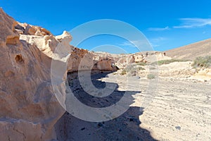 sand escarpments in enchanted ravine in the municipality of La Oliva photo