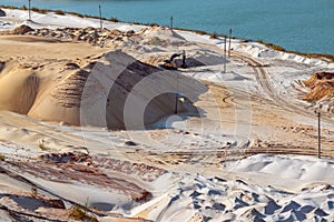 Sand extraction with machinery at quartz quarry