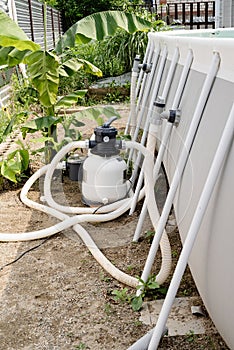 Sand filter plant at a pool in the backyard
