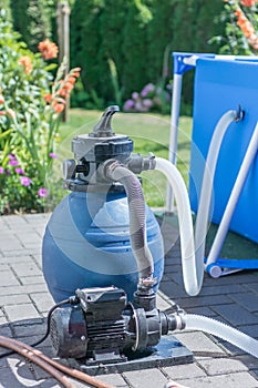 Sand filter with pump on a pool to keep the pool water clean