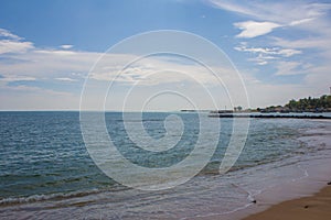 Sand and fishing boats on the beach. photo