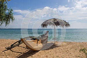 Sand and fishing boats on the beach. photo