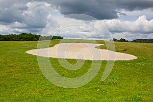 Sand golf bunker on a empty golf course