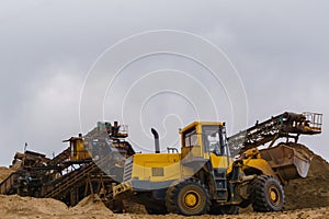 Sand and gravel separator and bucket loader