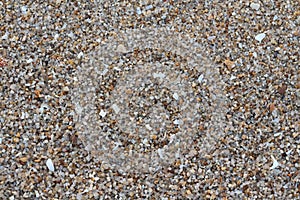 Sand gravel texture on the beach for background. Top view photo