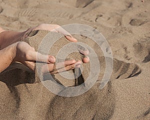 sand in hands