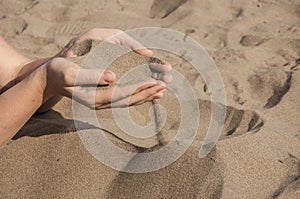 sand in hands