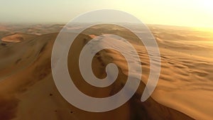 Sand landscape, drone or desert in Namibia for sunset, nature beauty on dry land, horizon or Africa drought. Hill, earth