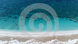 sand made up of small colored stones on the beach of Is Arutas in Sardinia, Italy photo