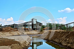 Sand making plant in mining quarry. Crushing factory with production line for crushing, grinding stone, sorting sand and bulk