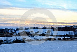 Sand mining in winter conditions in an industrial quarry.