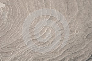 Sand pattern of a beach in the summer