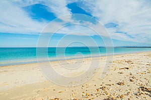 Sand and pebbles in Fiume Santo beach