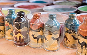 Sand pictures bottles for sale at bedouin market