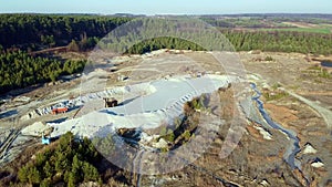 Sand quarry lake forest aerial view
