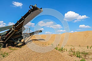 Sand quarry panorama landscape mound machinery working machinery extract extraction