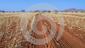 Sand road in Marienfluss valley in Namibia.