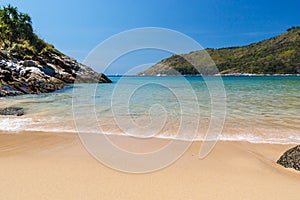 Sand and rock view of Nai Harn Beach