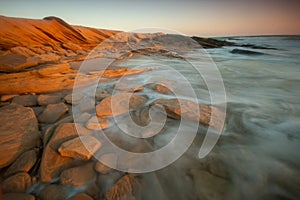 Sand rocks beach, desert beside the sea, Sharqiya, Oman