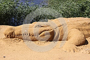 Sand sculpture alligator
