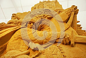 Sand sculpture of knightly battle