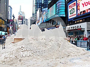 Sand sculpturing in times square.
