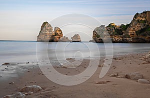 Sand and sea at Praia do Camilo Beach - Long Exposure shot - Lagos, Algarve, Portugal