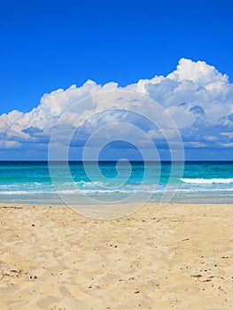 Sand, sea, sky e cloudy... tropical beach with small waves. Enjoy your time!