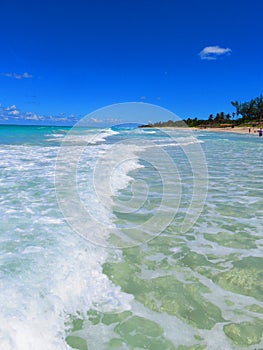 Sand, sea, sky e cloudy... tropical beach with small waves. Enjoy your time!