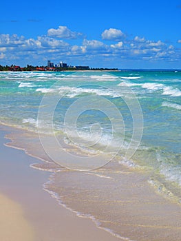 Sand, sea, sky e cloudy... tropical beach with small waves. Enjoy your time!