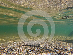 Sand and seabed underwater. Clear water in Lake Superior Michigan