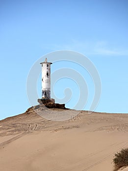 Crumbling lighthouse ruins on Shoreline of Sea of Cortez near El Golfo de Santa Clara, Sonora, Mexico photo