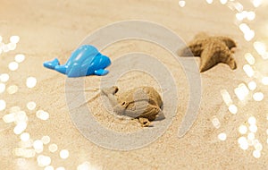 Sand shape made by whale mold on summer beach