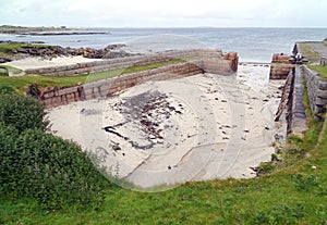 Sand silted harbour on Scottish island