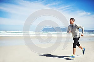 Sand, space or man at beach running for exercise, training or outdoor workout at sea for fitness. Sports person, mature