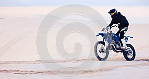 Sand, speed or athlete driving motorbike for action, adventure or fitness with performance or adrenaline. Fast, nature