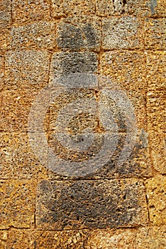 Sand stone wall at the ruins of the East Mebon Temple in Siem Reap, Cambodia.