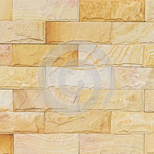 Sand stone wall texture and ackground of decorate photo